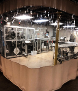 Advanced tea packaging machinery inside Custom Co-Pak's production facility in the USA.